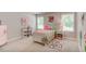 Charming bedroom with a pink and white theme at 167 Pretty Run Branch Ln, Wendell, NC 27591