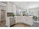 Spacious kitchen island with white cabinets and stainless steel appliances at 167 Pretty Run Branch Ln, Wendell, NC 27591