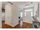 Bright entry hall with hardwood floors and view of the dining room at 167 Pretty Run Branch Ln, Wendell, NC 27591