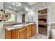 Double vanity bathroom with granite countertop and view of bedroom at 319 River Knoll Dr, Clayton, NC 27527