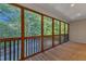 Enjoy the wooded view from this spacious screened porch at 319 River Knoll Dr, Clayton, NC 27527