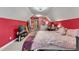 Bright bedroom featuring a queen bed and built-in storage at 319 River Knoll Dr, Clayton, NC 27527