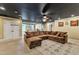 Open living area with sectional sofa and a fireplace at 319 River Knoll Dr, Clayton, NC 27527