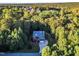 Aerial view of house with large yard and neighborhood in background at 319 River Knoll Dr, Clayton, NC 27527