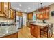 Modern kitchen with stainless steel appliances and granite countertops at 319 River Knoll Dr, Clayton, NC 27527