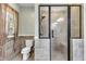Bathroom with toilet and a large walk in shower at 319 River Knoll Dr, Clayton, NC 27527