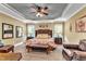 Spacious Primary bedroom with a king-size bed, and seating area at 319 River Knoll Dr, Clayton, NC 27527