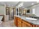 Double vanity bathroom with granite countertop, shower, and toilet at 319 River Knoll Dr, Clayton, NC 27527