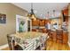 Eat-in kitchen with hardwood floors and ample cabinetry at 319 River Knoll Dr, Clayton, NC 27527