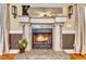 Elegant fireplace with granite surround and decorative mantel at 319 River Knoll Dr, Clayton, NC 27527
