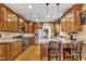 Modern kitchen with stainless steel appliances and granite countertops at 319 River Knoll Dr, Clayton, NC 27527