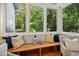 Built-in window seat with cushions, offering a cozy reading nook at 675 Whitehurst, Pittsboro, NC 27312