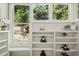 Bright reading nook with built-in shelves and backyard view at 675 Whitehurst, Pittsboro, NC 27312