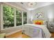 Spacious bedroom with large windows and hardwood floors at 675 Whitehurst, Pittsboro, NC 27312