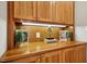 Custom wooden cabinets with interior lighting at 675 Whitehurst, Pittsboro, NC 27312