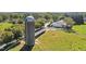 Farm with silo, barn, and grazing cows at 675 Whitehurst, Pittsboro, NC 27312