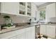 Spacious kitchen with granite countertops and stainless steel appliances at 675 Whitehurst, Pittsboro, NC 27312