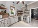 Modern kitchen with stainless steel appliances and a vent hood at 26 Oak St, Roxboro, NC 27573