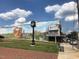 Historic downtown mural with a clock tower at 26 Oak St, Roxboro, NC 27573