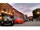 Charming town square with gazebo and clock tower, showcasing a lively community atmosphere at 26 Oak St, Roxboro, NC 27573