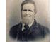 Black and white portrait of a Personal in formal attire at 26 Oak St, Roxboro, NC 27573