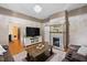 Spacious living room features a fireplace and hardwood floors at 26 Oak St, Roxboro, NC 27573