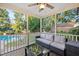 Relaxing screened porch overlooking the backyard pool and patio at 26 Oak St, Roxboro, NC 27573