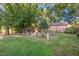 Spacious backyard with playground and fenced play area at 26 Oak St, Roxboro, NC 27573