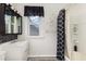 Clean bathroom with a white vanity and shower at 415 N Hyde Park Ave, Durham, NC 27703