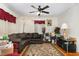 Spacious living room with hardwood floors and a sectional sofa at 415 N Hyde Park Ave, Durham, NC 27703