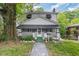 Two-story house featuring a front porch and walkway at 415 N Hyde Park Ave, Durham, NC 27703