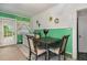 Kitchen with a dining area and white cabinets at 415 N Hyde Park Ave, Durham, NC 27703