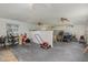 Unfinished bonus room with multiple ceiling fans at 415 N Hyde Park Ave, Durham, NC 27703