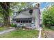 A charming two-story home with a large front yard at 415 N Hyde Park Ave, Durham, NC 27703