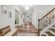 Entryway with hardwood floors and staircase at 179 Ivory Ln, Raleigh, NC 27610