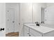 Bathroom with white quartz countertop, oil-rubbed bronze faucet at 420 Oak Park Blvd, Youngsville, NC 27596