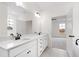 Bright bathroom with double vanity, white quartz countertop, and oil-rubbed bronze fixtures at 420 Oak Park Blvd, Youngsville, NC 27596