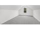 Empty bedroom with vaulted ceiling and gray carpet at 420 Oak Park Blvd, Youngsville, NC 27596