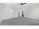 Main bedroom with ensuite bathroom, walk-in closet, and gray carpet at 420 Oak Park Blvd, Youngsville, NC 27596