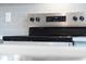 Close-up of a stainless steel oven with digital display and sleek controls at 420 Oak Park Blvd, Youngsville, NC 27596