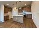 Modern kitchen with island and stainless steel appliances at 607 Hillfarm Dr, Wake Forest, NC 27587