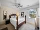 Bedroom with a large bed, dresser, and ceiling fan at 7017 Jeffreys Creek Ln, Raleigh, NC 27616