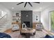 Light and airy living room with fireplace and hardwood floors at 3723 Bellevue Rd, Raleigh, NC 27609