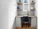 Built-in shelves and desk create a functional home office space at 3723 Bellevue Rd, Raleigh, NC 27609