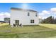 Home's backyard with patio and grassy area at 203 Calebs Corner Pl, Spring Lake, NC 28390