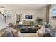 Bright and airy living room with comfortable seating at 203 Calebs Corner Pl, Spring Lake, NC 28390