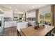 Open concept kitchen with island and breakfast nook at 203 Calebs Corner Pl, Spring Lake, NC 28390