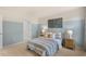 Light and airy bedroom with a queen-size bed at 203 Calebs Corner Pl, Spring Lake, NC 28390