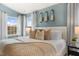 Bright bedroom with king-size bed and soft textiles at 203 Calebs Corner Pl, Spring Lake, NC 28390