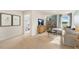 Bright bonus room features a comfy sectional sofa and built-in shelving at 203 Calebs Corner Pl, Spring Lake, NC 28390